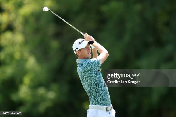 Tom McKibbin of Northern Ireland plays his second shot on the 7th hole on Day Four of the Porsche European Open at Green Eagle Golf Course on June...