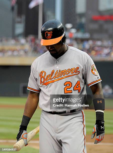 Wilson Betemit of the Baltimore Orioles looks on during the game against the Minnesota Twins on July 18, 2012 at Target Field in Minneapolis,...