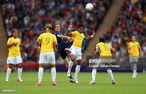 Jill Scott of Great Britain battles for the ball with Ester of Brazil during the Women's Football first round Group E Match between Great Britain and...