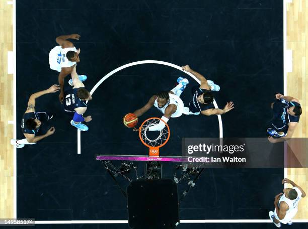 Ronny Turiaf of France puts up a shot in the Men's Basketball Preliminary Round match between France and Argentina on Day 4 of the London 2012...