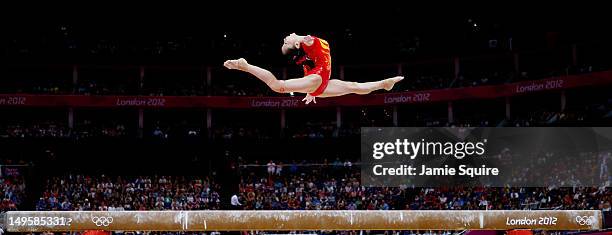 Linlin Deng of China competes on the balance beam in the Artistic Gymnastics Women's Team final on Day 4 of the London 2012 Olympic Games at North...