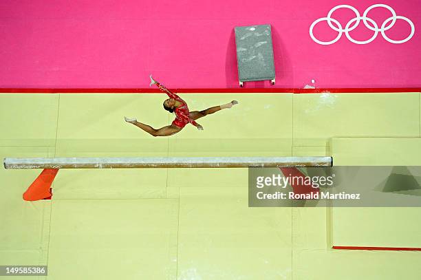 Gabrielle Douglas of the United States performs on the balance beam in the Artistic Gymnastics Women's Team final on Day 4 of the London 2012 Olympic...