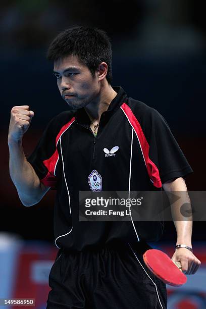 Chih-Yuan Chuang of Chinese Taipei celebrates during the Men's Singles Table Tennis quarter-final match against Adrian Crisan of Romania on Day 4 of...