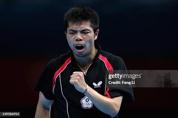 Chih-Yuan Chuang of Chinese Taipei celebrates during the Men's Singles Table Tennis quarter-final match against Adrian Crisan of Romania on Day 4 of...