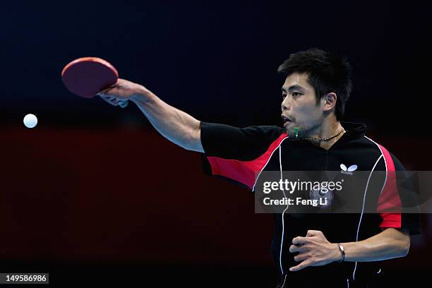 Chih-Yuan Chuang of Chinese Taipei competes during the Men's Singles Table Tennis quarter-final match against Adrian Crisan of Romania on Day 4 of...