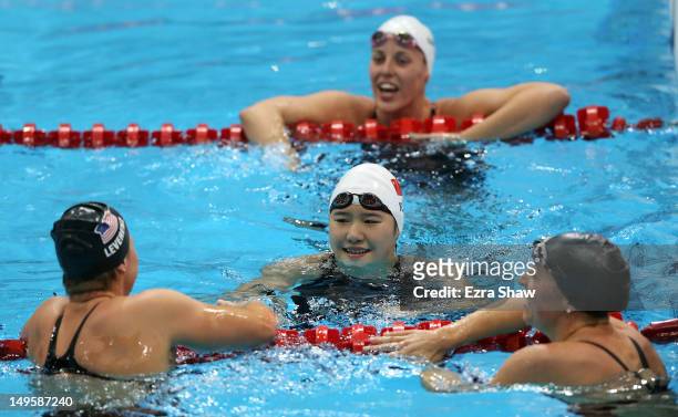 Shiwen Ye of China is congratulated by Caitlin Leverenz of the United States, Alicia Coutts of Australia and Katinka Hosszu of Hungary after winning...