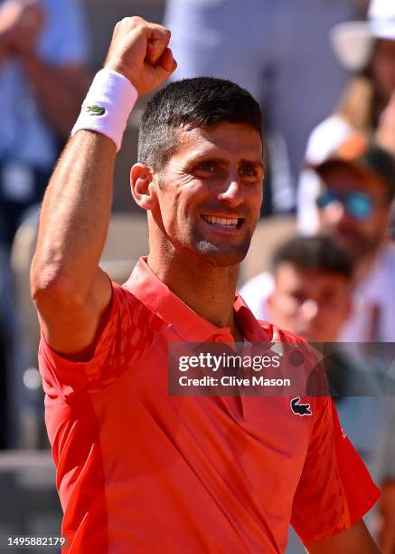 Novak Djokovic of Serbia celebrates winning match point against Pablo Juan Varillas of Peru during the Men's Singles Fourth Round match on Day Eight...