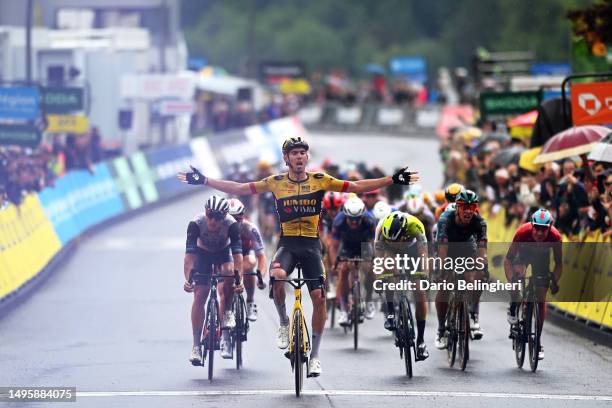 Christophe Laporte of France and Team Jumbo-Visma celebrates at finish line as stage winner ahead of Matteo Trentin of Italy and UAE Team Emirates,...