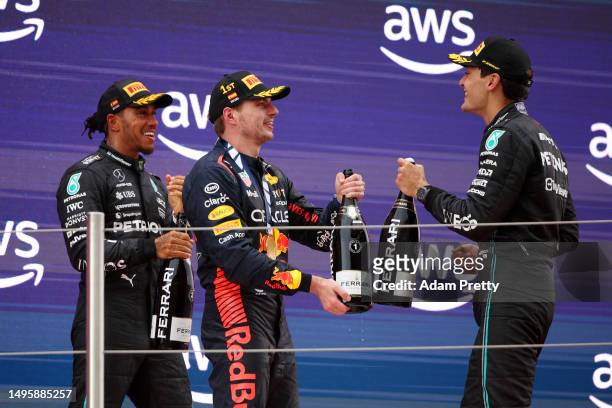 Race Winner Max Verstappen of the Netherlands and Oracle Red Bull Racing, Second placed Lewis Hamilton of Great Britain and Mercedes and Third placed...