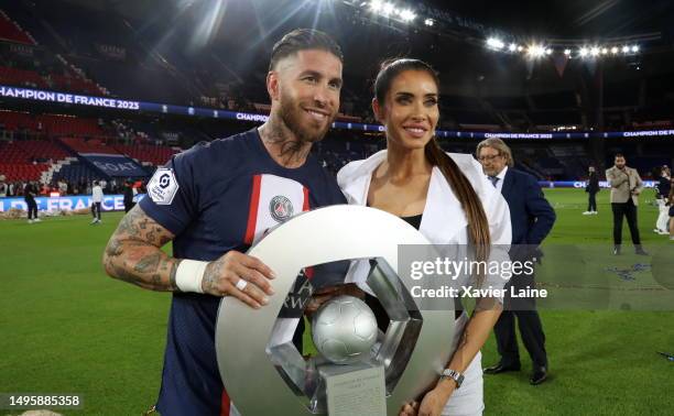Sergio Ramos of Paris Saint-Germain celebrate the championship trophy with his wife, Pilar Rubio after the Ligue 1 match between Paris Saint-Germain...