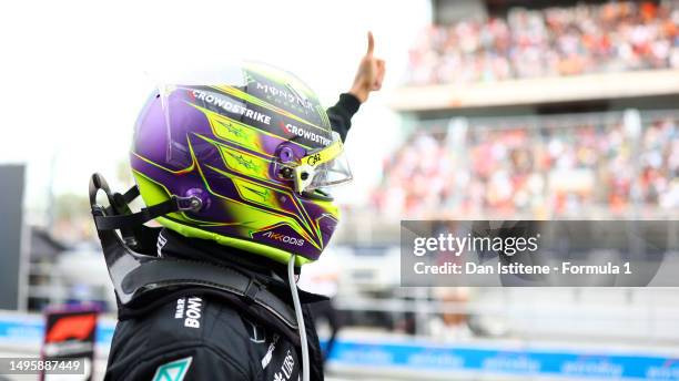 Second placed Lewis Hamilton of Great Britain and Mercedes celebrates in parc ferme during the F1 Grand Prix of Spain at Circuit de...