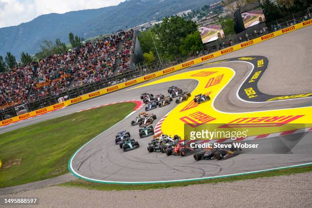 Formula 1 drivers at turn one-two after the Start of the race during the F1 Grand Prix of Spain at Circuit de Barcelona-Catalunya on June 04, 2023 in...