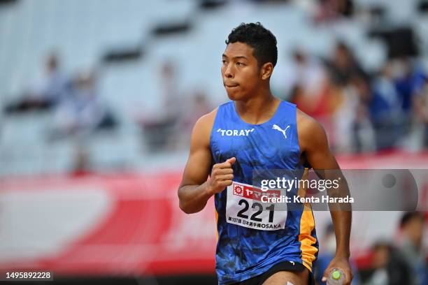 Abdul Hakim Sani Brown waves as he is introduced prior to the start of Men's 100m Final on day four of the 107th JAAF Championships at Yanmar Stadium...