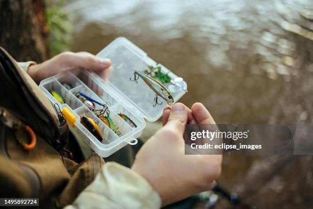 queste sono grandi esche che i pesci amano - canna da pesca foto e immagini stock