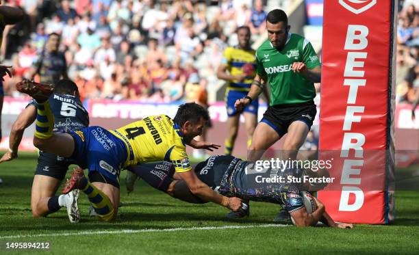 Hull FC player Danny Houghton dives over to score the first Hull try during the Betfred Super League Magic Weekend match between Hull FC and...