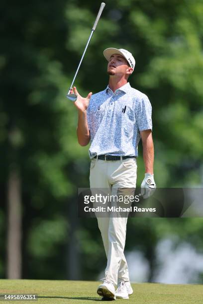 Sam Bennett of the United States reacts to a shot from the ninth fairway during the final round of the Memorial Tournament presented by Workday at...