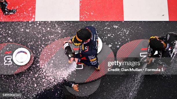 Race Winner Max Verstappen of the Netherlands and Oracle Red Bull Racing and Second placed Lewis Hamilton of Great Britain and Mercedes celebrate on...