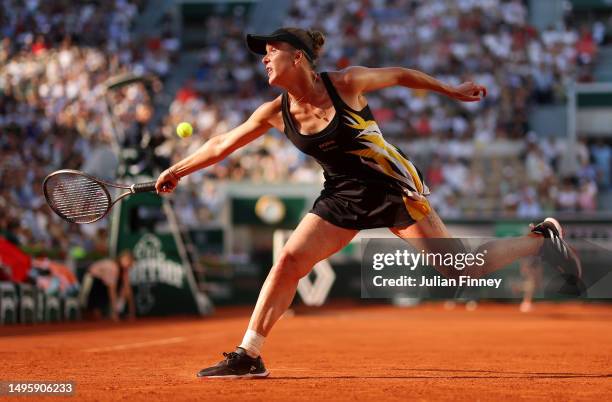 Elina Svitolina of Ukraine plays a backhand against Darya Kasatkina during the Women's Singles Fourth Round match on Day Eight of the 2023 French...