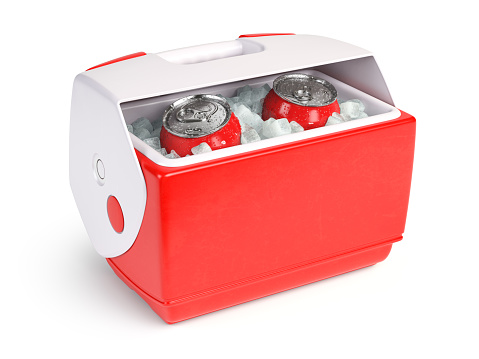 Plastic cool box or small cooler with a beer cans or soda drinks in ice isolated on white.