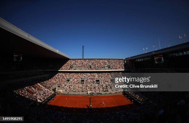 General view inside of Court Philippe Chatrier as Carlos Alcaraz of Spain plays a backhand against Lorenzo Musetti of Italy during the Men's Singles...