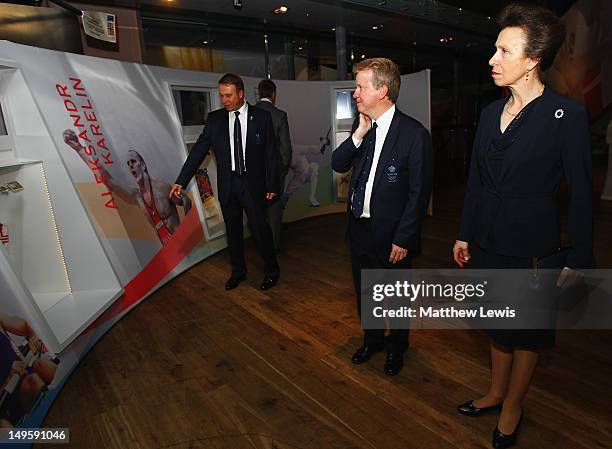 Princess Anne, The Princess Royal looks at the exhibition with British Olympic Association Chair Lord Colin Moynihan during a reception at The Royal...