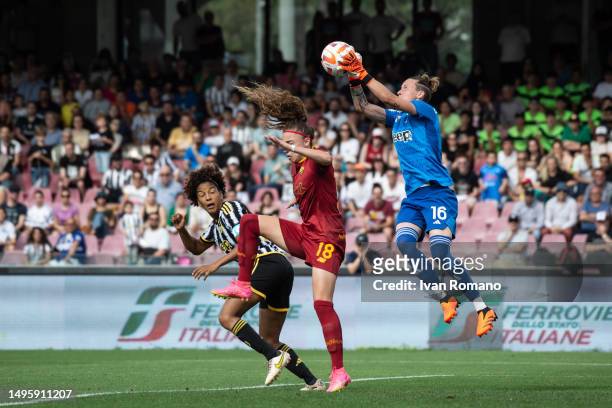 Pauline Peyraud-Magnin of Juventus FC and Benedetta Glionna of AS Roma jump for the ball during the women Coppa Italia 2022/23 final match between...