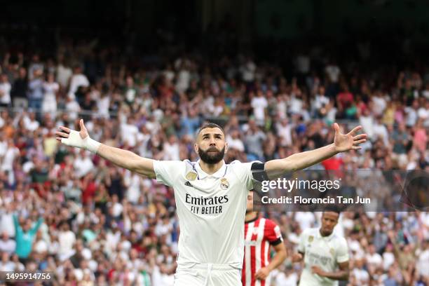 Karim Benzema of Real Madrid celebrates after scoring the team's first goal from a penalty kick during the LaLiga Santander match between Real Madrid...