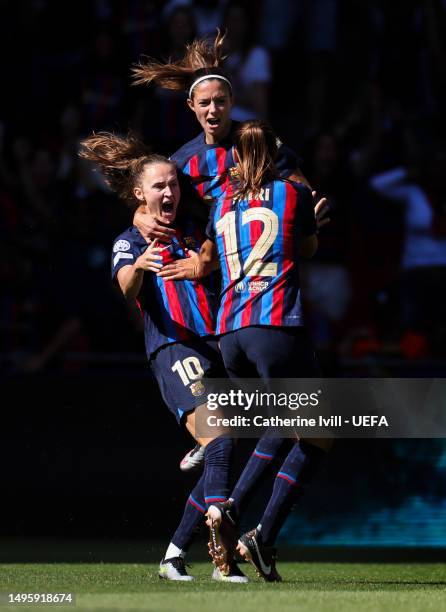 Patri Guijarro of FC Barcelona celebrates with teammates after scoring the team's first goal during the UEFA Women's Champions League final match...