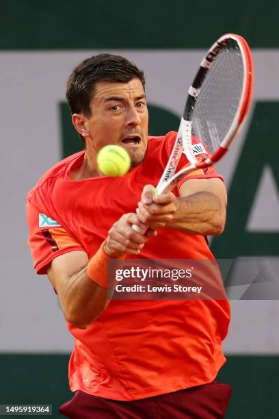 Sebastian Ofner of Austria plays a backhand against Stefanos Tsitsipas of Greece during the Men's Singles Fourth Round match on Day Eight of the 2023...