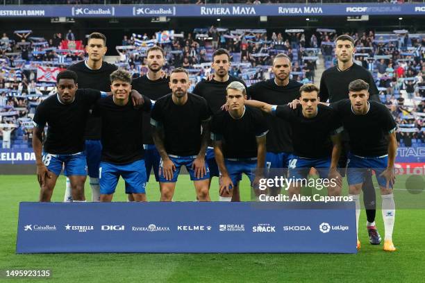 Espanyol players wear black t'shirts in protest against referees as they pose for a team photo prior to the LaLiga Santander match between RCD...