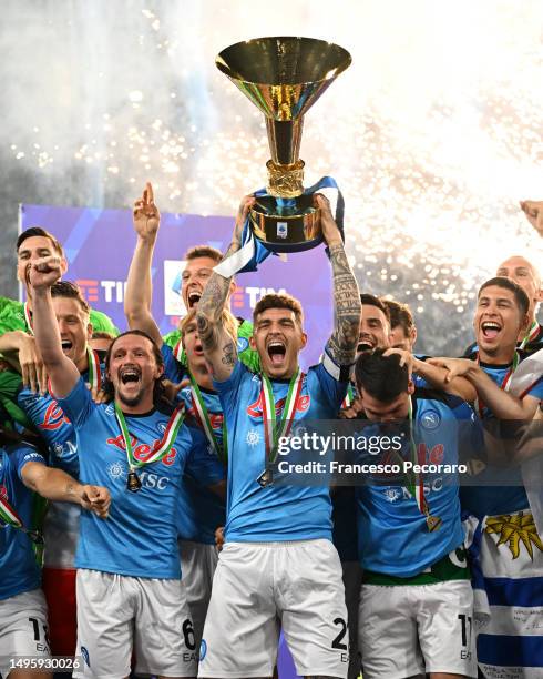 Giovanni Di Lorenzo of SSC Napoli lifts the Serie A trophy following the Serie A match between SSC Napoli and UC Sampdoria at Stadio Diego Armando...