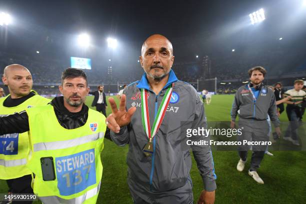 Luciano Spalletti, Head Coach of SSC Napoli, celebrates with their Serie A winners medal following the Serie A match between SSC Napoli and UC...