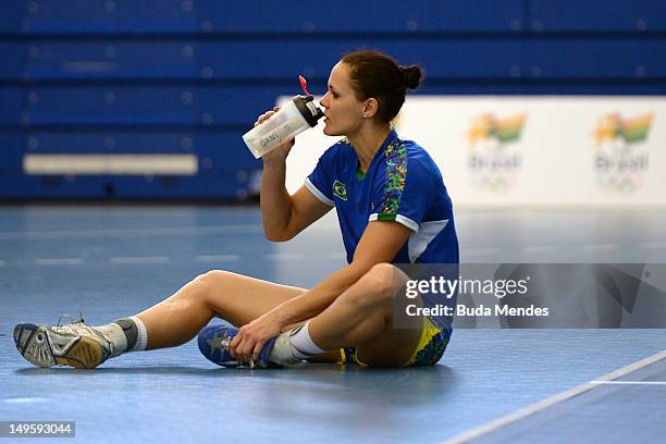 Dani Piedade rests during a Brazilian olympic handball team training session at the Crystal Palace on July 31, 2012 in London, England.