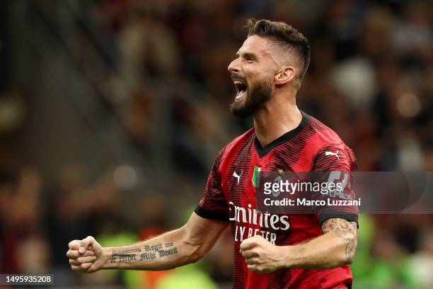 Milan, ITALY Olivier Giroud of AC Milan celebrates after scoring their sides first goal from the penalty spot during the Serie A match between AC...