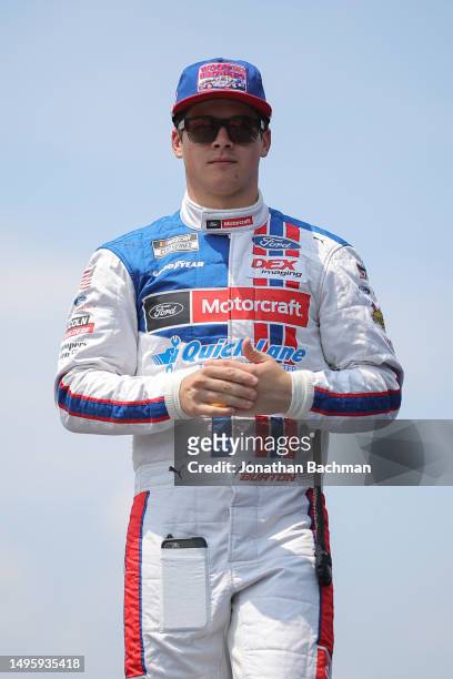 Harrison Burton, driver of the Motorcraft/Quick Lane Ford, walks onstage during driver intros prior to the NASCAR Cup Series Enjoy Illinois 300 at...