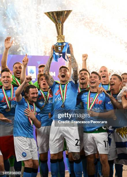 Giovanni Di Lorenzo of SSC Napoli lifts the Serie A trophy following the Serie A match between SSC Napoli and UC Sampdoria at Stadio Diego Armando...