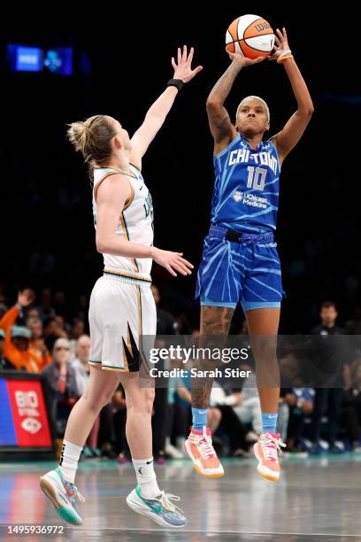 Courtney Williams of the Chicago Sky shoots the ball as Courtney Vandersloot of the New York Liberty defends during the second half at Barclays...