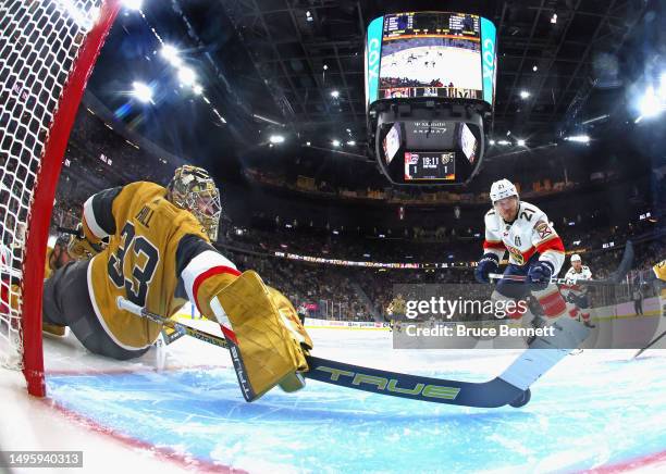 Adin Hill of the Vegas Golden Knights makes the save against Nick Cousins of the Florida Panthers during the second period in Game One of the 2023...