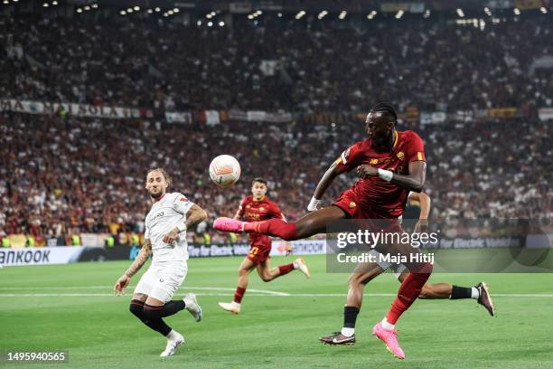 Tammy Abraham of AS Roma jumps for the ball during the UEFA Europa League 2022/23 final match between Sevilla FC and AS Roma at Puskas Arena on May...