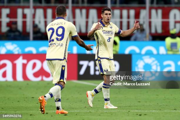 Milan, ITALY Marco Davide Faraoni of Hellas Verona celebrates after scoring their sides first goal during the Serie A match between AC Milan and...