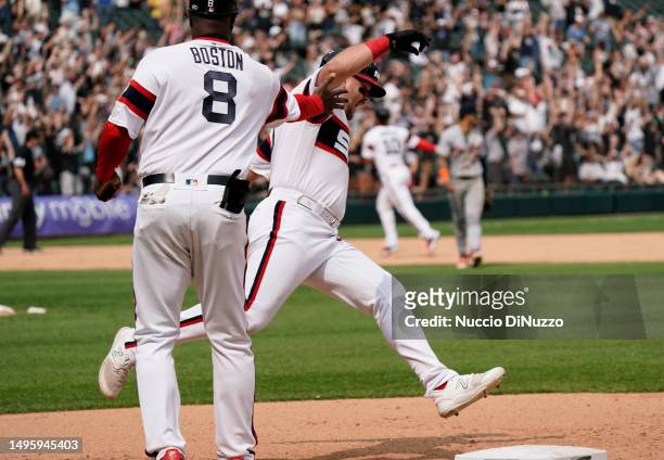 Jake Burger of the Chicago White Sox celebrates a walk off grand slam during the ninth inning of a game against the Detroit Tigers at Guaranteed Rate...