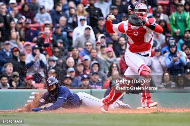 Manuel Margot of the Tampa Bay Rays scores in the six inning against the Boston Red Sox at Fenway Park on June 04, 2023 in Boston, Massachusetts.