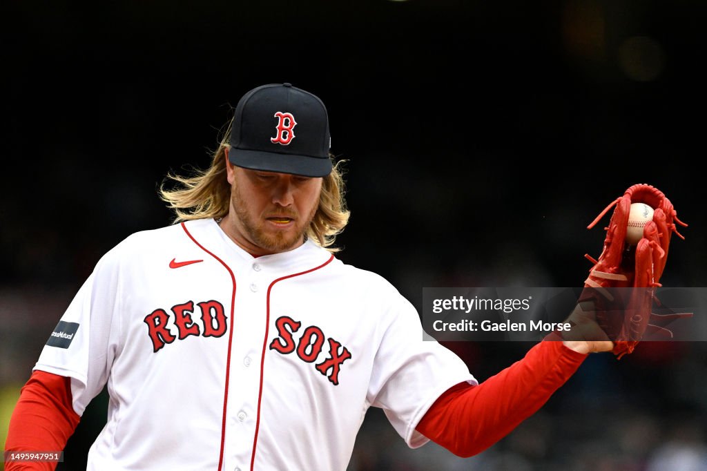 Kaleb Ort of the Boston Red Sox catches a ball for an out at first ...