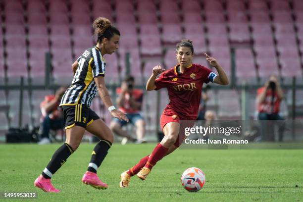 Arianna Caruso of Juventus FC and Elisa Bartoli of AS Roma compete for the ball during the women Coppa Italia 2022/23 final match between Juventus FC...