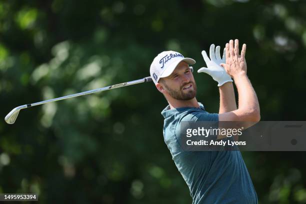 Wyndham Clark of the United States reacts to a shot from the 14th tee during the final round of the Memorial Tournament presented by Workday at...