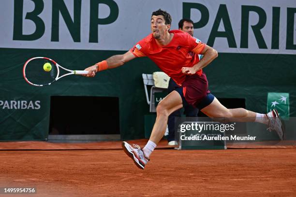 Sebastian Ofner of Austria plays a forehand against Stefanos Tsitsipas of Greece during the Men's Singles Fourth Round match on Day Eight of the 2023...