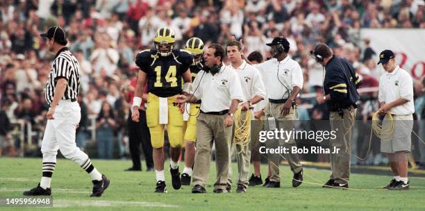 University of Michigan Quarterback Brian Griese with Coaching Staff during game action at Rose Bowl of Michigan Wolverines against Washington State...