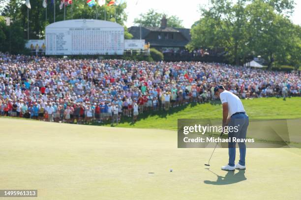 Denny McCarthy of the United States putts on the 18th green during a playoff in the final round of the Memorial Tournament presented by Workday at...