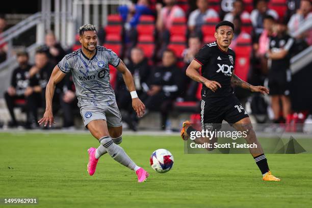 Ariel Lassiter of CF Montréal and Andy Najar of D.C. United compete for the ball during the first half of the MLS game at Audi Field on May 31, 2023...