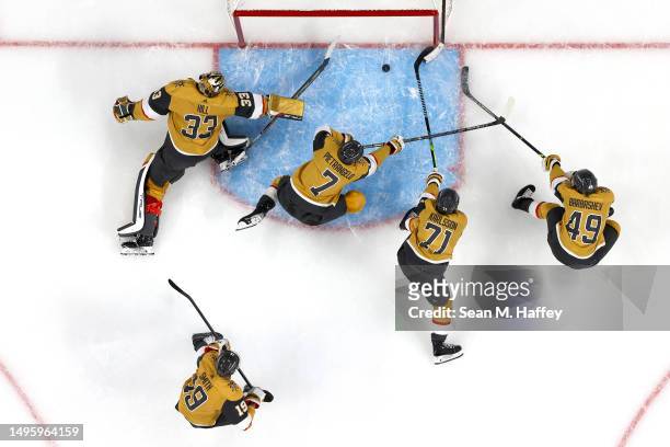 Adin Hill, Alex Pietrangelo, Ivan Barbashev, Reilly Smith and William Karlsson of the Vegas Golden Knights are unable to stop a goal by Eric Staal of...